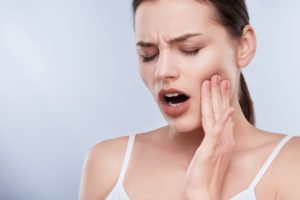 Woman with TMJ Pain