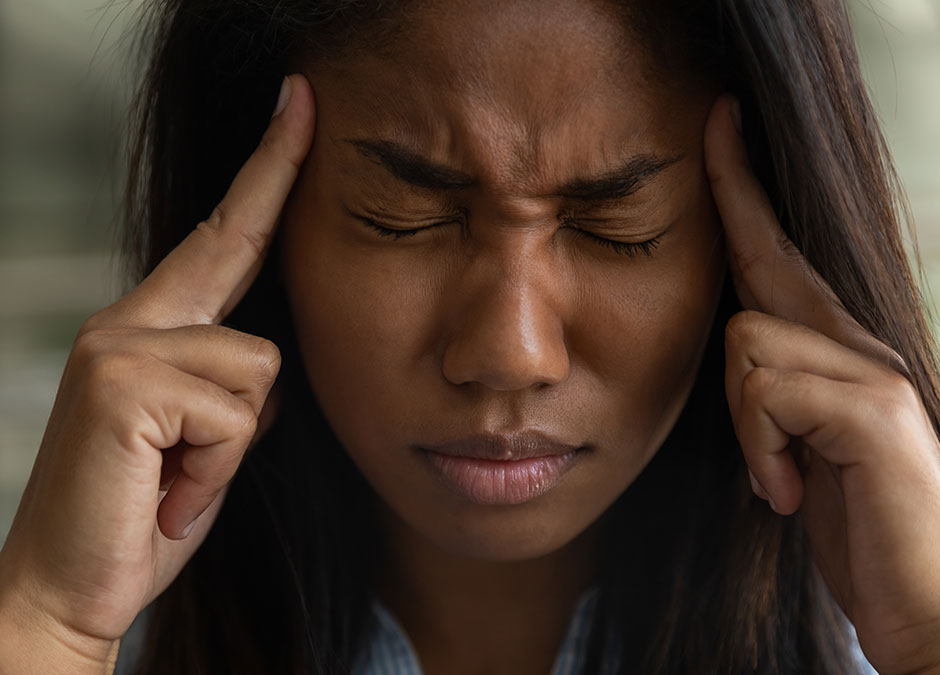 tired biracial woman employee struggle with dizziness or blurry vision